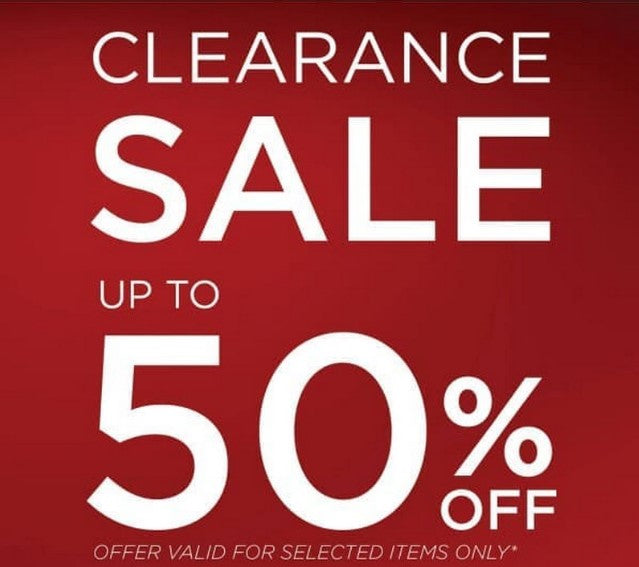 Red clearance sale sign for discounted items.