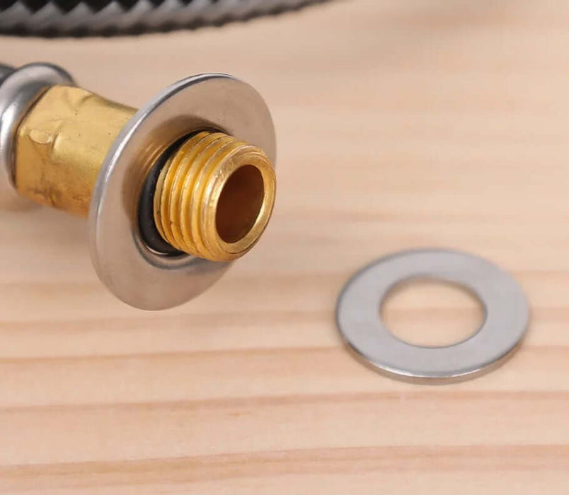 Brass fitting with stainless steel washer on wooden surface from 360pc Stainless Steel Washer Set