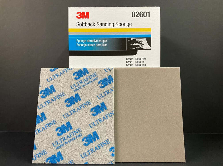 3M 02601 Softback Sanding Sponge 1200/1500 grit with flexible foam backing for sanding hard-to-reach areas on vehicles.