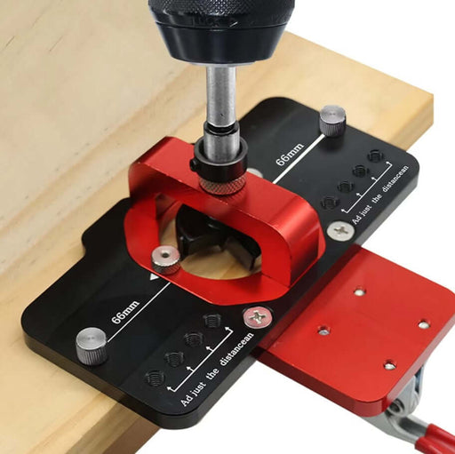 Woodworking hole drilling guide locator with drill and hinge boring jig for precise hinge positioning.